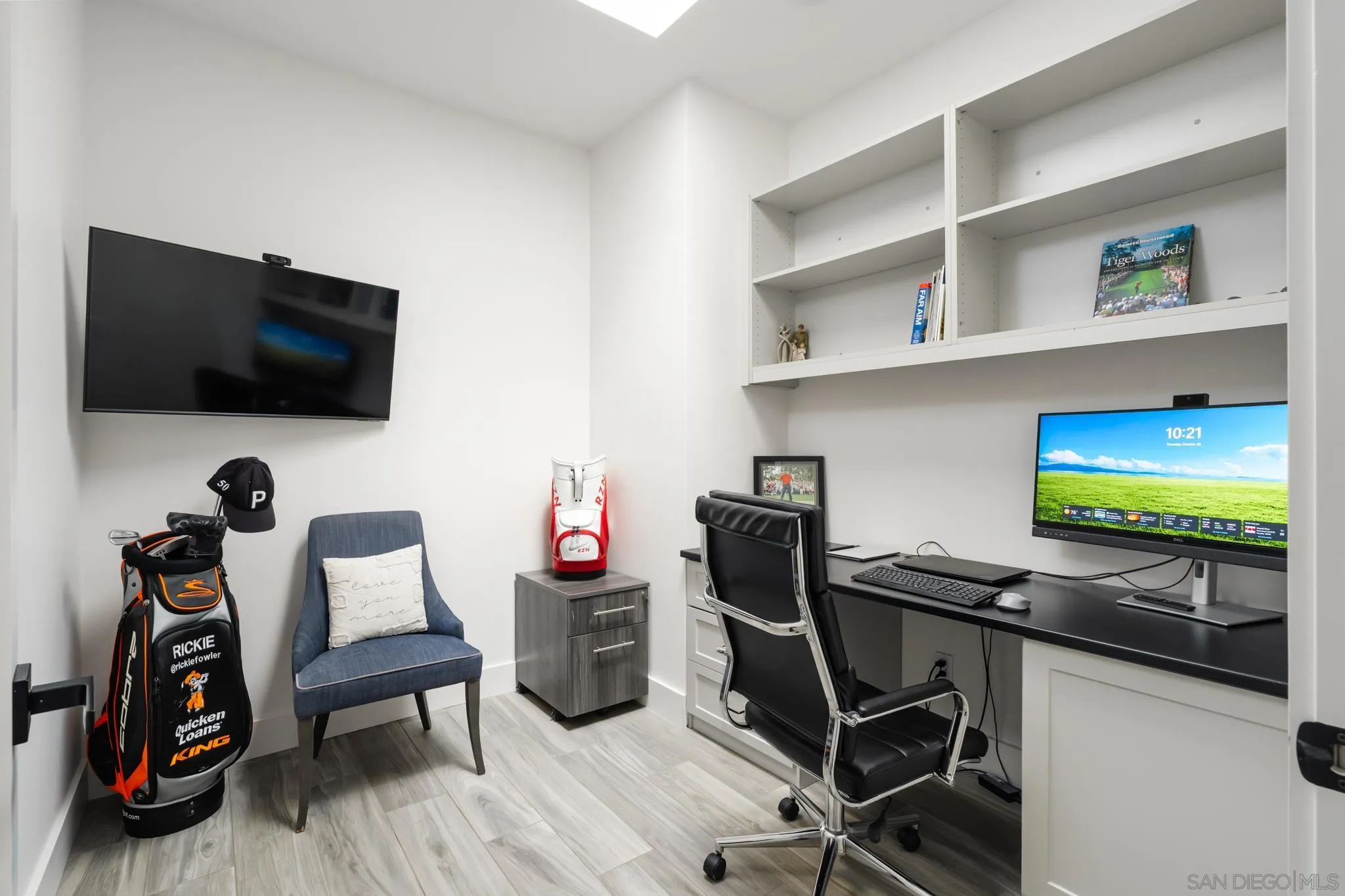 15102 Sun Valley Lane Del Mar, CA 92014 - Photo 44 of 45 a view of a workspace with furniture and a flat screen tv