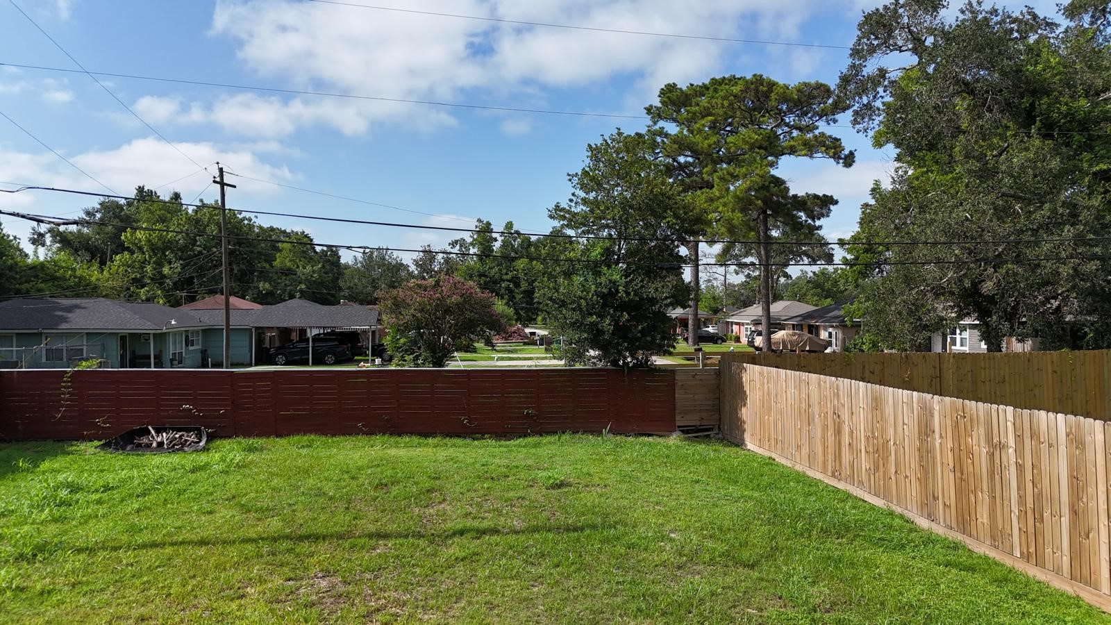 2441 Garapan Street Houston, TX 77091 - Photo 3 of 6 a yard with lots of green space
