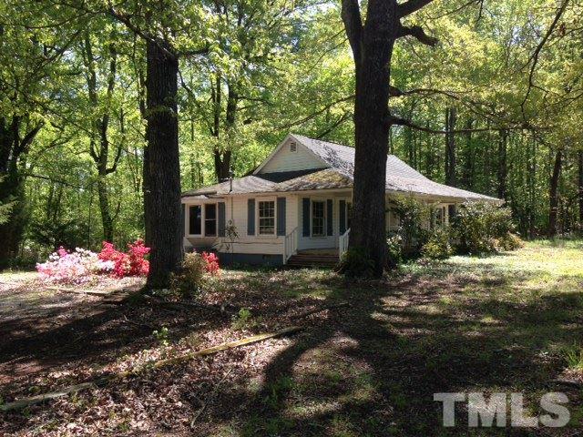 4720 Green Riley Road Rougemont, NC 27572 - Photo 2 of 8 a front view of a house with a yard