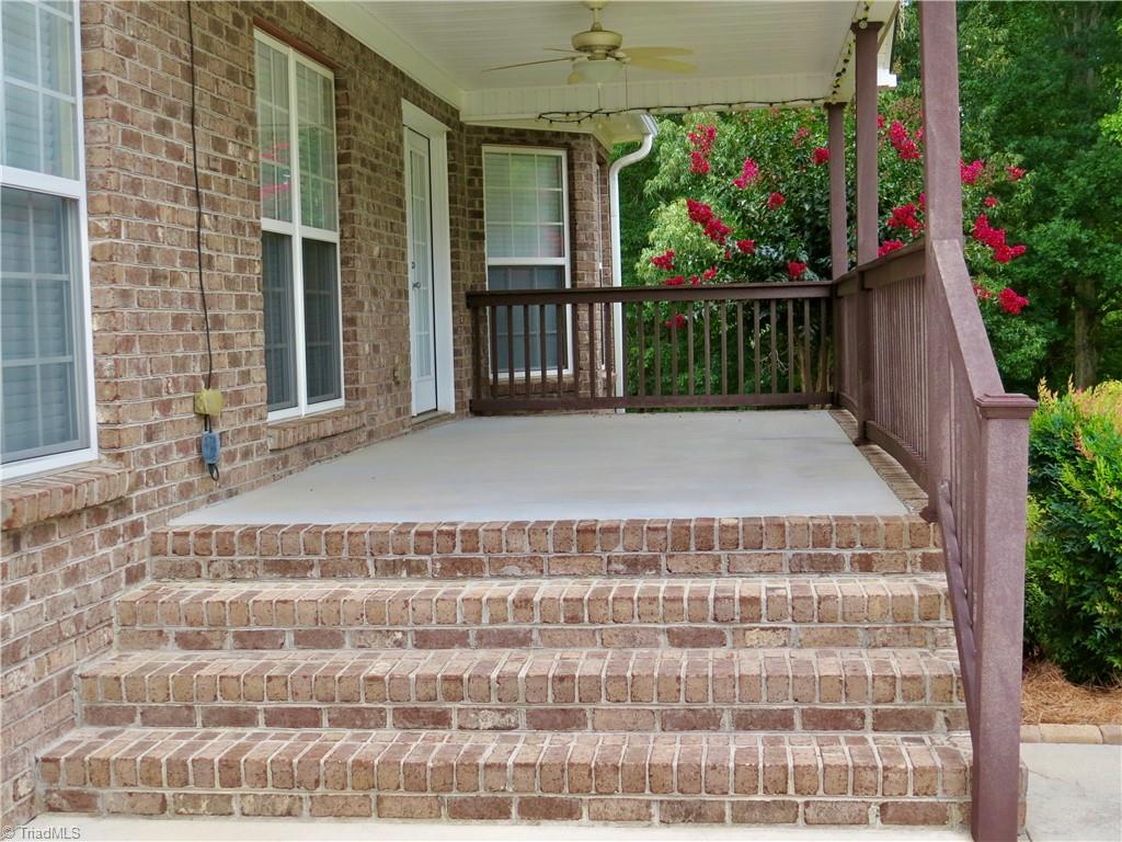 132 Feather Ridge Circle Reidsville, NC 27320 - Photo 41 of 42 Large covered porch with trex railing