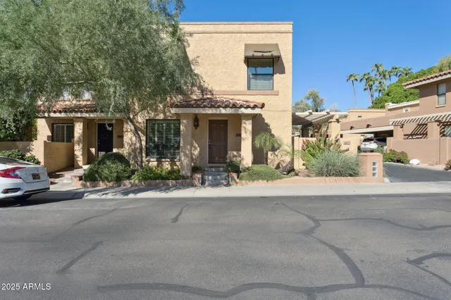 front view of a house with a street