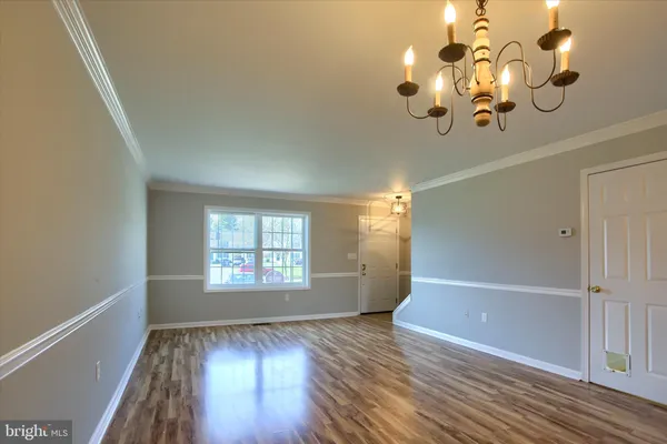 a view of deck with wooden floor and fence