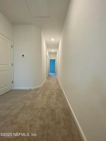 a bathroom with a sink double vanity and a mirror