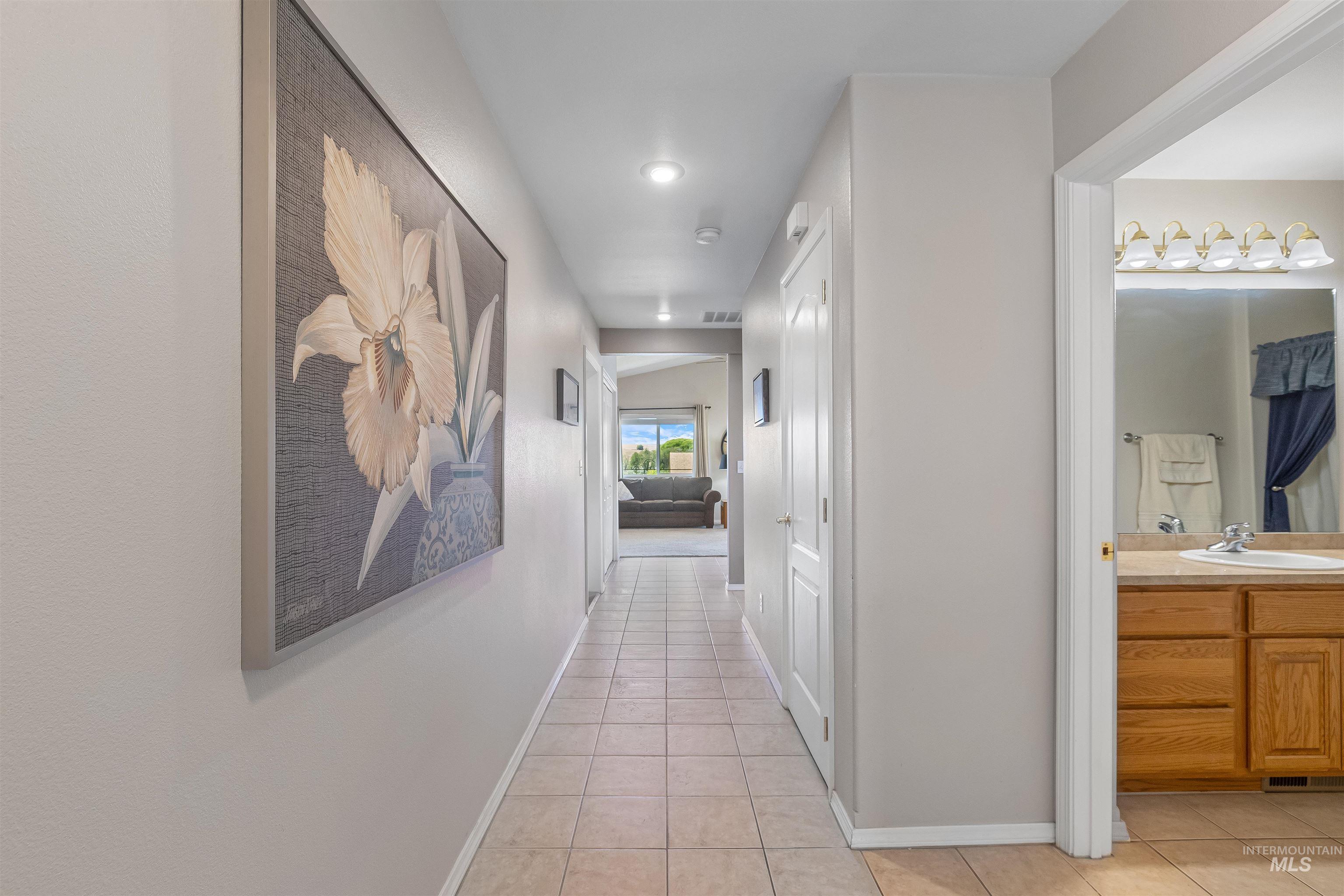 935 Grelle Avenue Lewiston, ID 83501 - Photo 6 of 33 Hallway featuring light tile patterned floors and recessed lighting