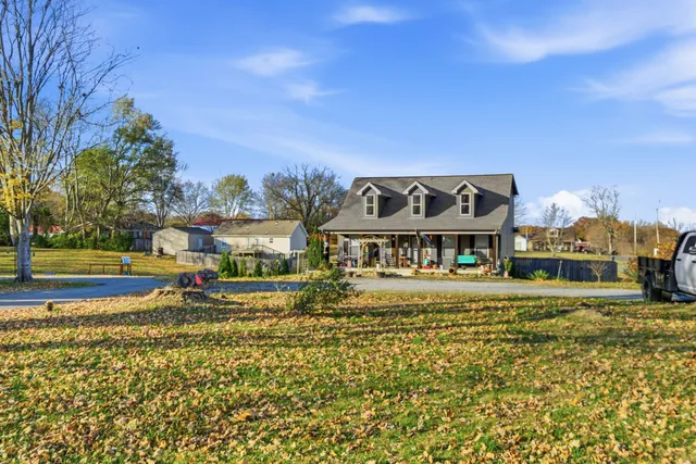 a view of a house with a big yard