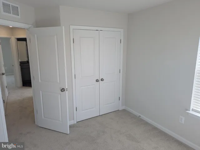 a view of room with hallway