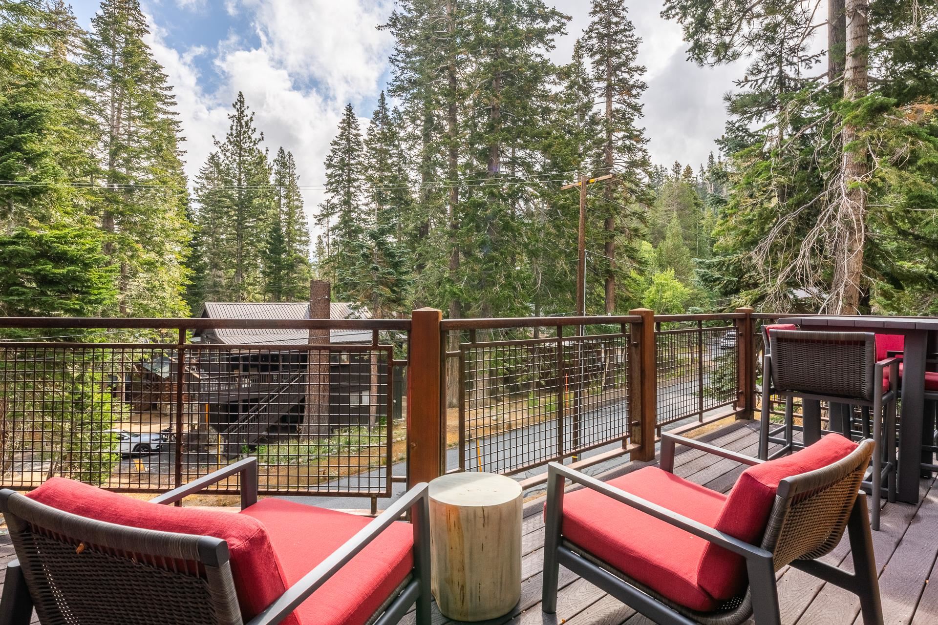 62 Cliff Circle Mammoth Lakes, CA 93546 - Photo 13 of 45 a view of a patio with a table chairs and a potted plant