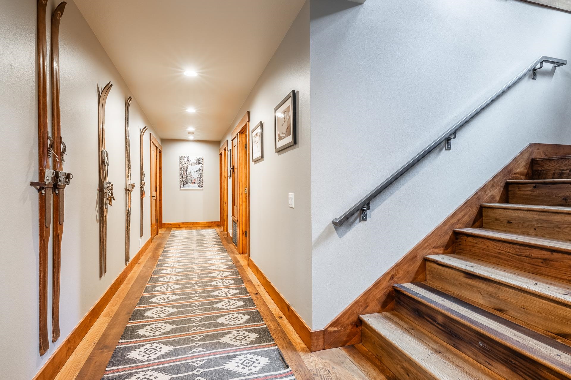 62 Cliff Circle Mammoth Lakes, CA 93546 - Photo 26 of 45 a view of a hallway with wooden floor and stairs