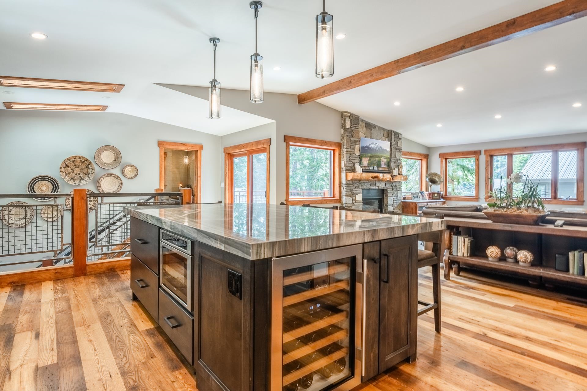 62 Cliff Circle Mammoth Lakes, CA 93546 - Photo 3 of 45 a kitchen with stainless steel appliances granite countertop a large stove a sink dishwasher and cabinets with wooden floor