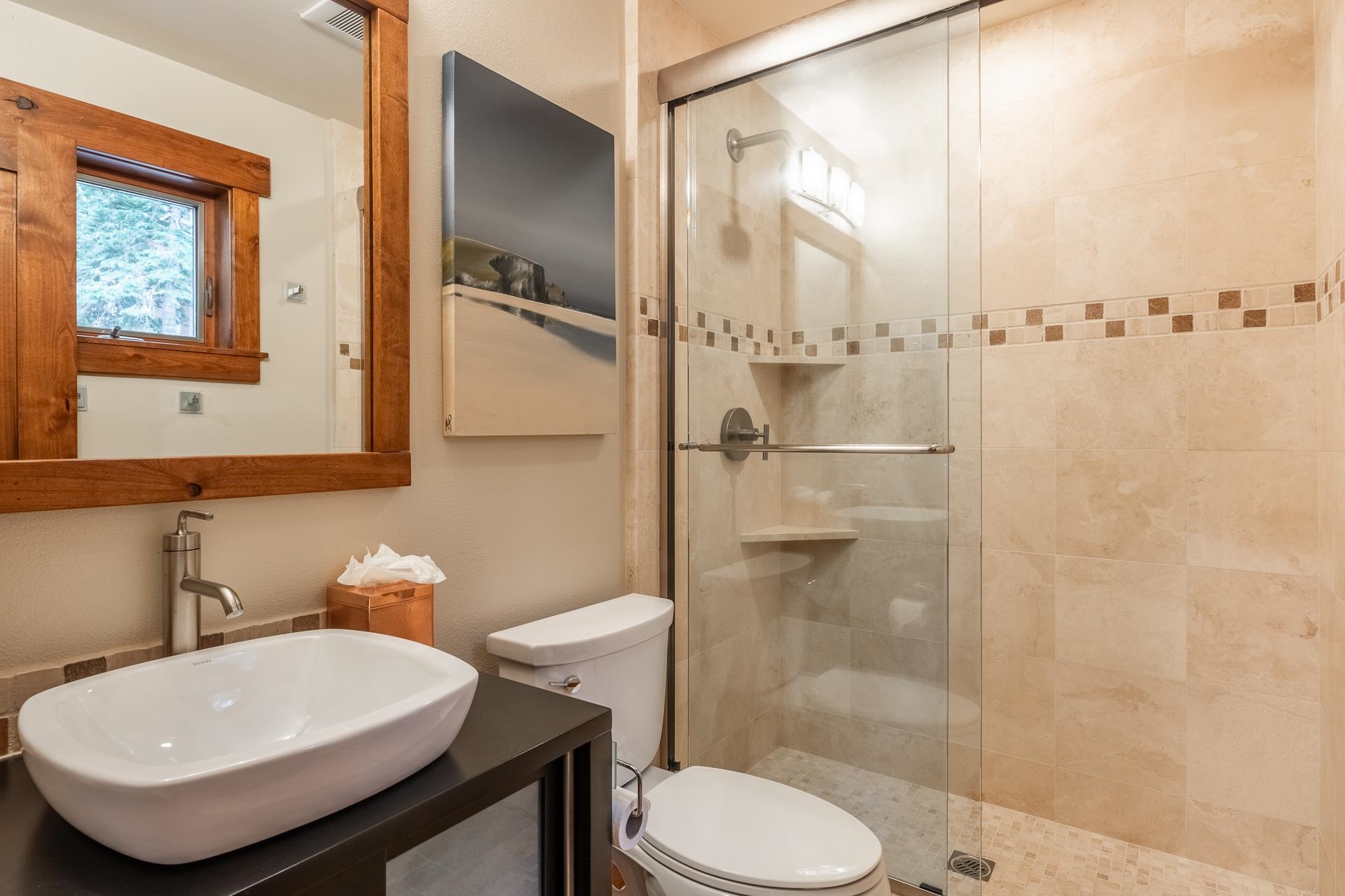 62 Cliff Circle Mammoth Lakes, CA 93546 - Photo 37 of 45 a bathroom with a sink toilet a mirror and shower