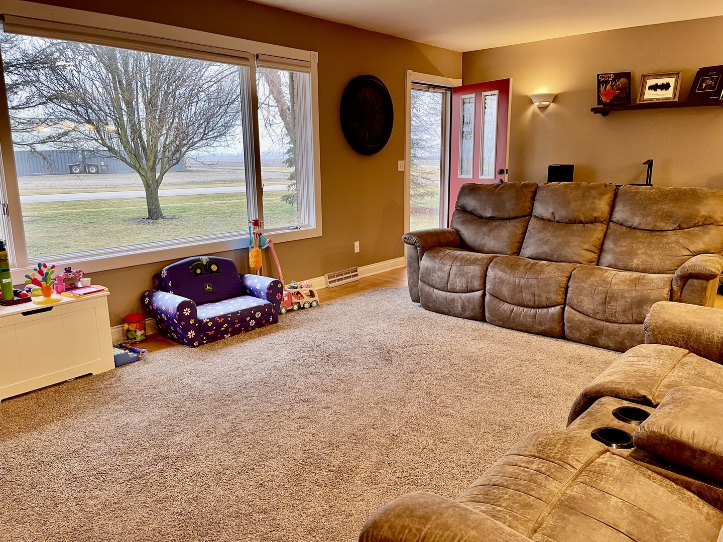 811 North 38th Road Mendota, IL 61342 - Photo 12 of 27 a living room with furniture a rug and a large window