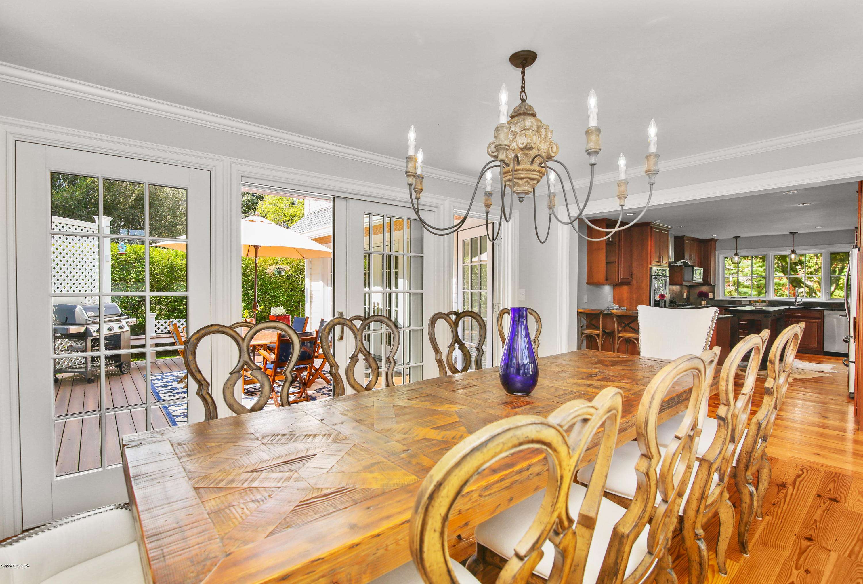 20 Scott Road Greenwich, CT 06831 - Photo 12 of 42 a view of a dining room with furniture and chandelier
