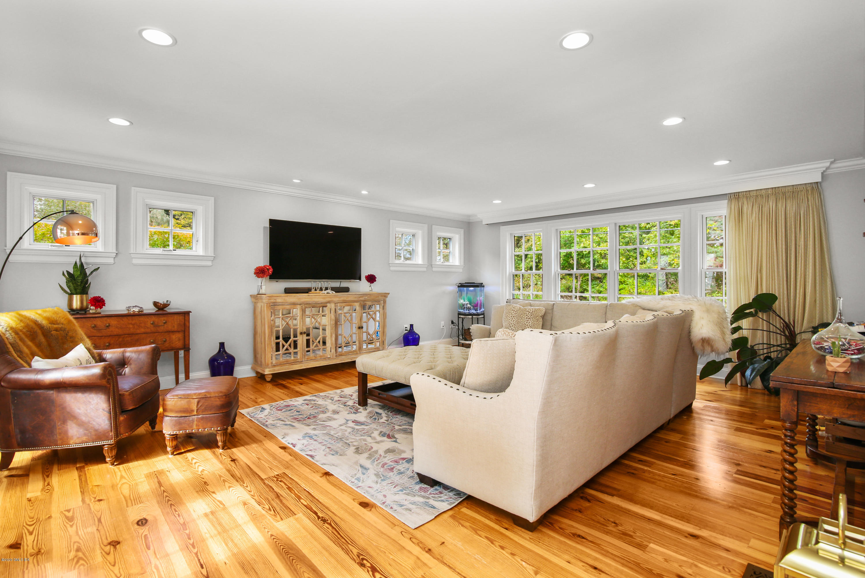 20 Scott Road Greenwich, CT 06831 - Photo 15 of 42 a living room with furniture and a flat screen tv