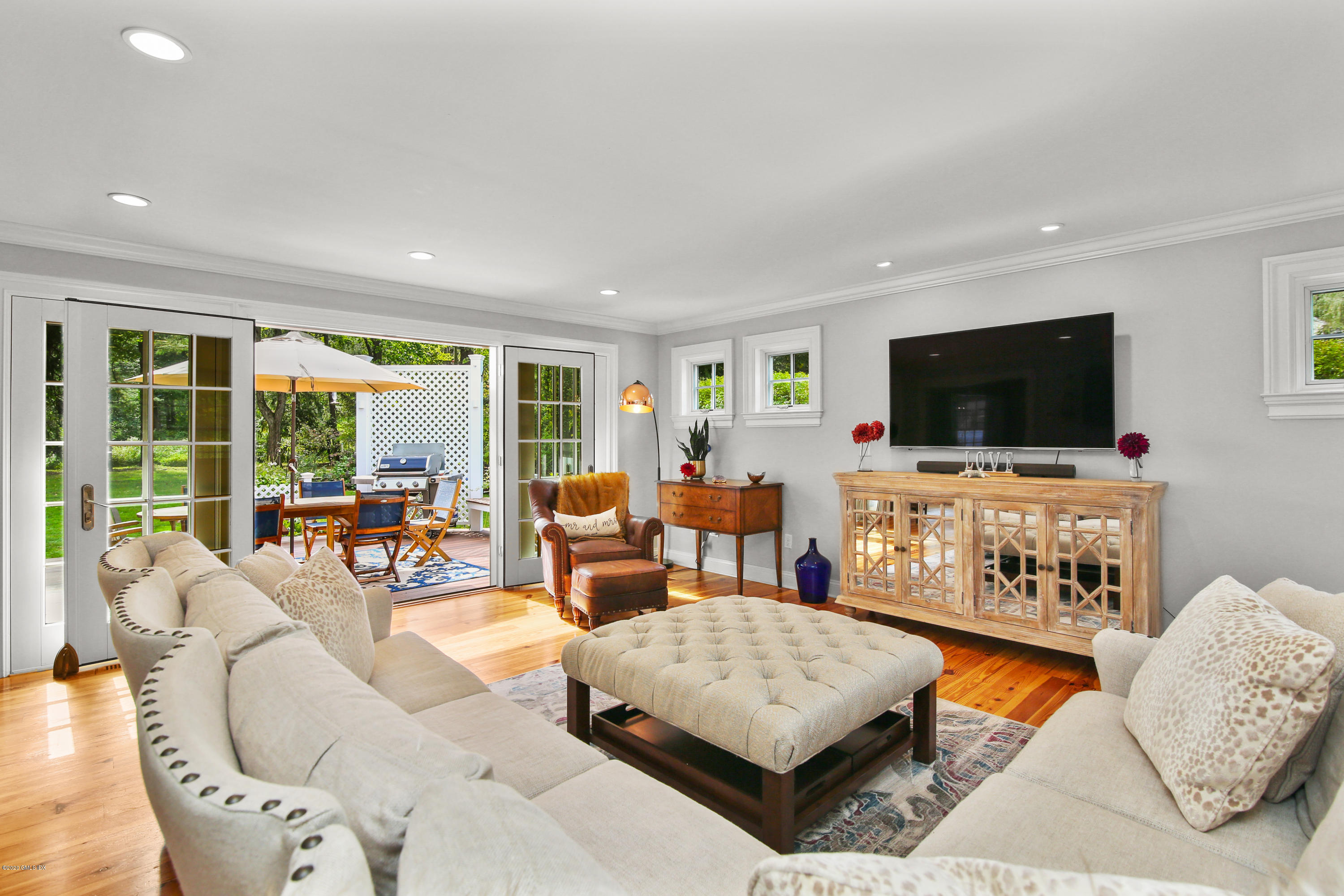 20 Scott Road Greenwich, CT 06831 - Photo 17 of 42 a living room with furniture and a flat screen tv