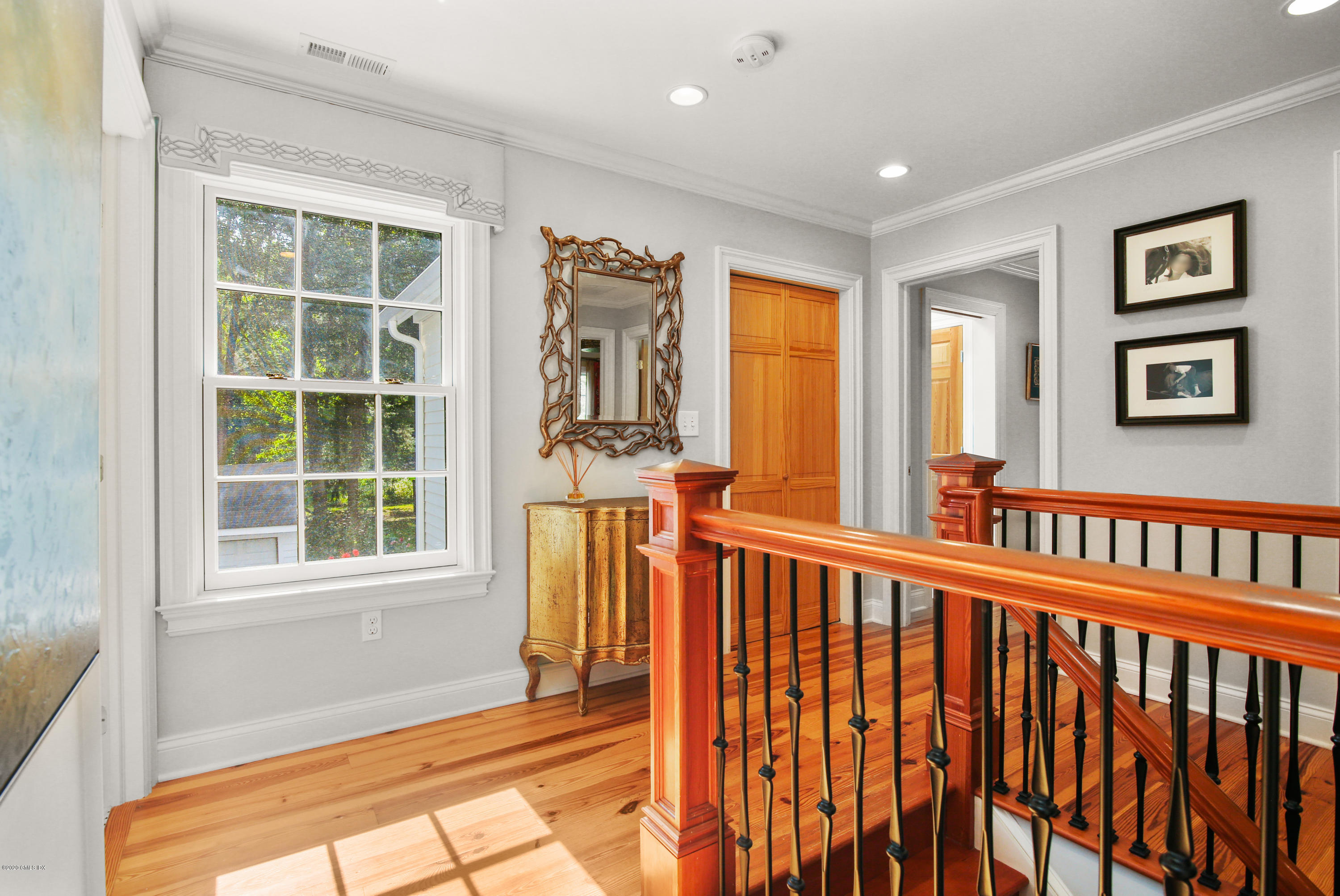 20 Scott Road Greenwich, CT 06831 - Photo 21 of 42 a view of a porch with wooden floor and windows
