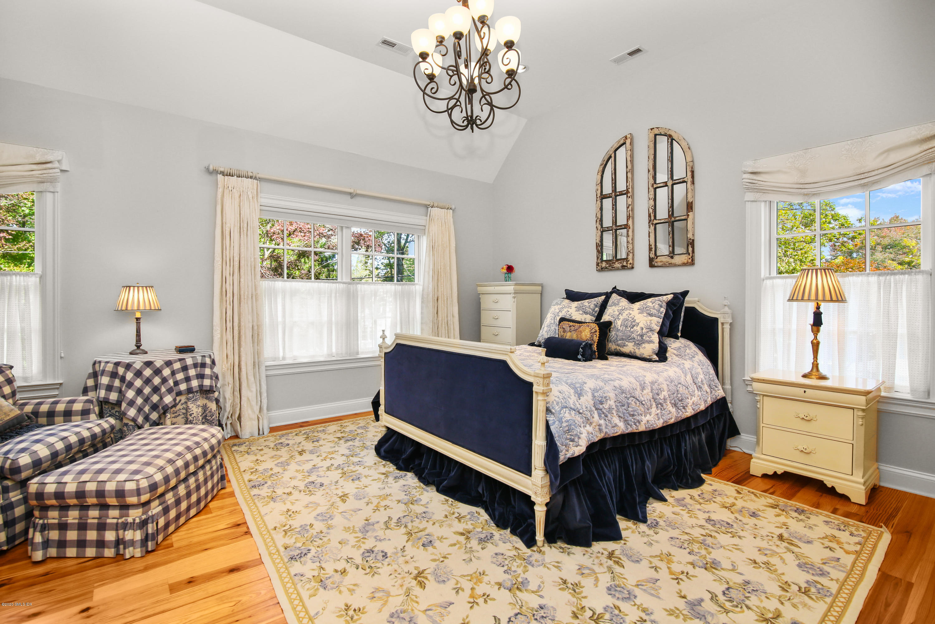 20 Scott Road Greenwich, CT 06831 - Photo 22 of 42 a bedroom with a large bed and a window