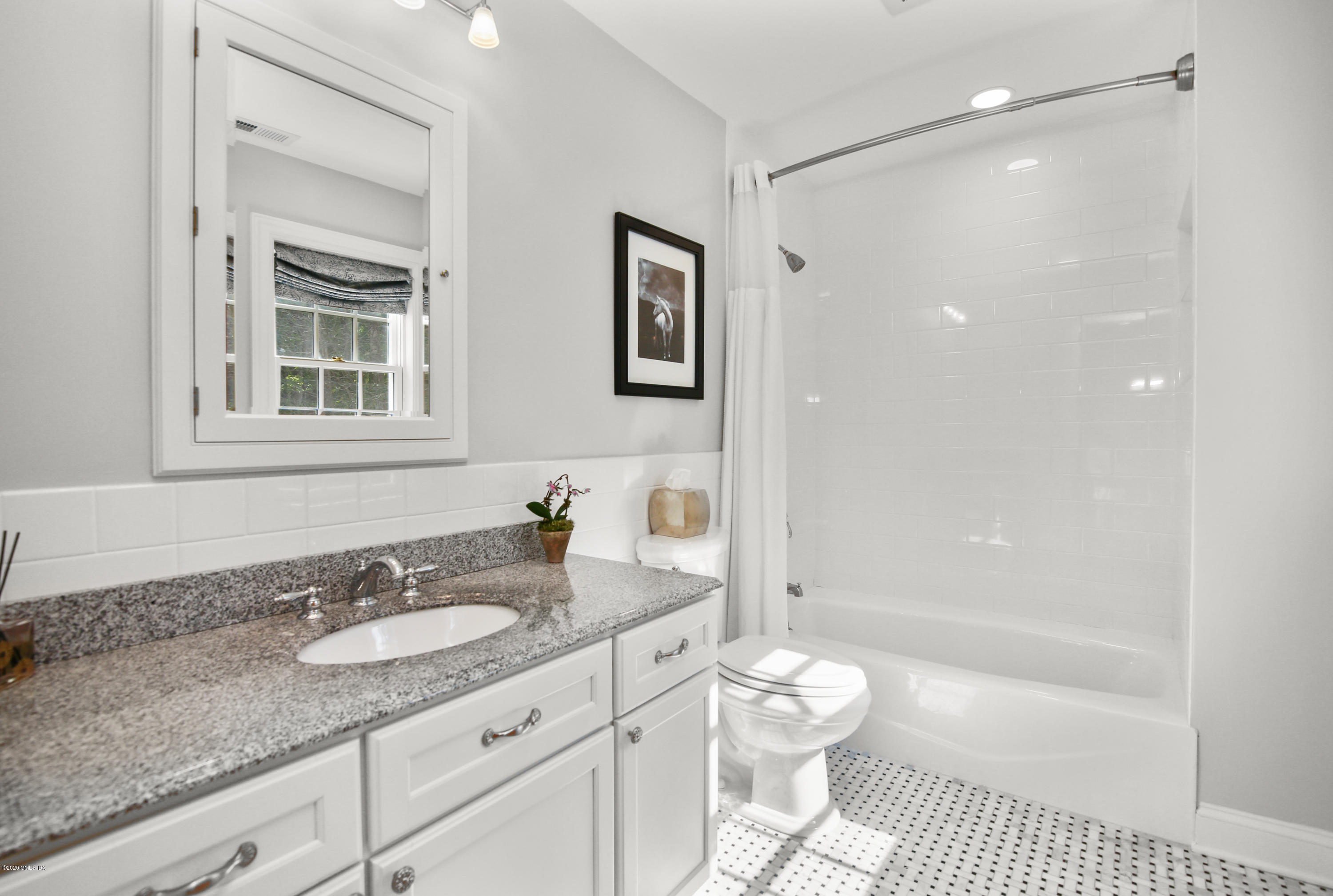 20 Scott Road Greenwich, CT 06831 - Photo 24 of 42 a bathroom with a granite countertop sink toilet and shower