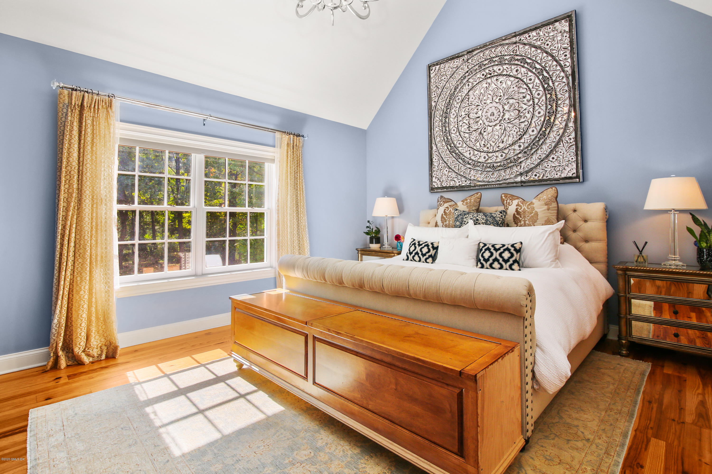 20 Scott Road Greenwich, CT 06831 - Photo 25 of 42 a bed sitting in a bedroom next to a window