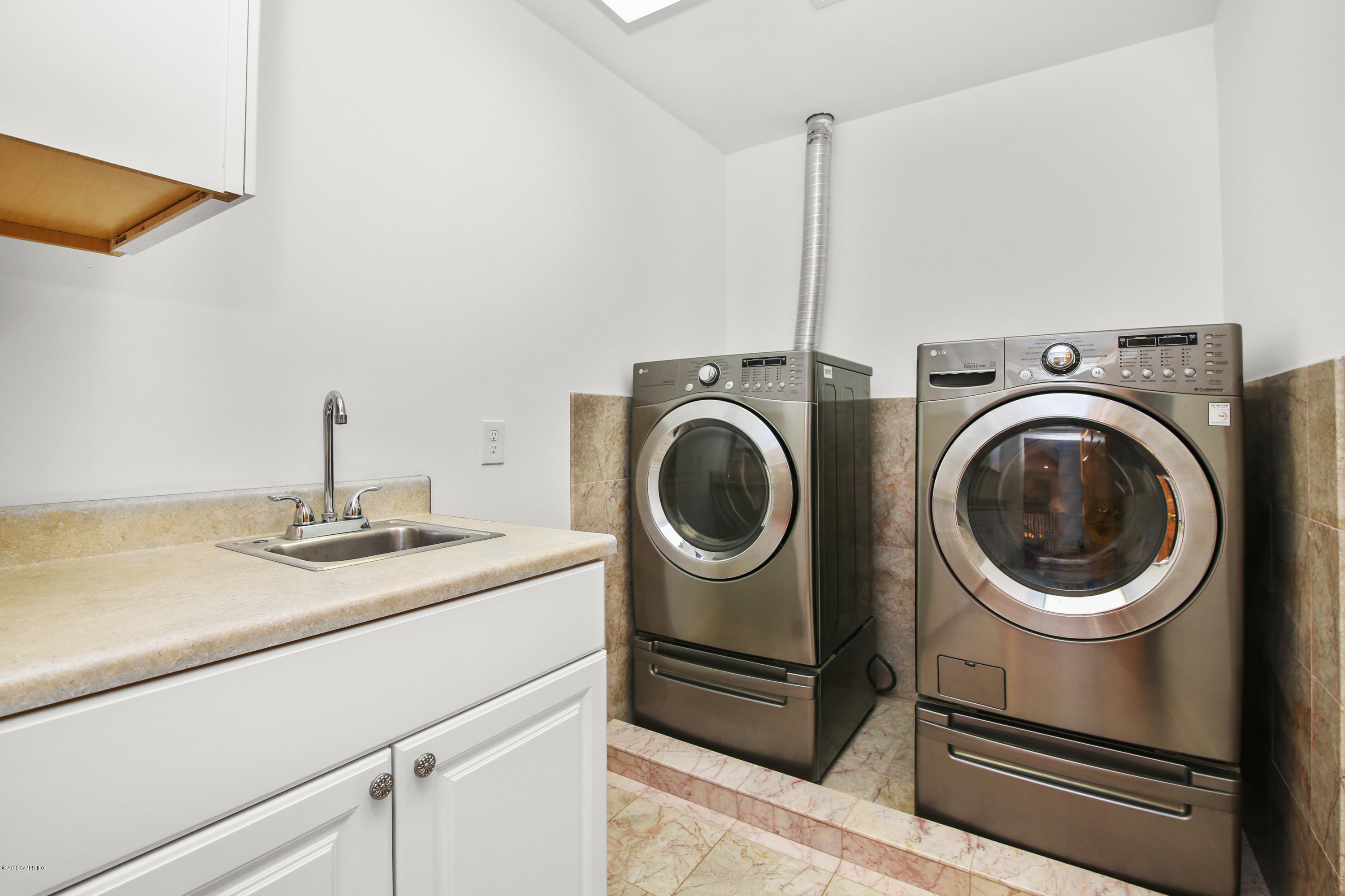 20 Scott Road Greenwich, CT 06831 - Photo 29 of 42 a utility room with dryer and washer