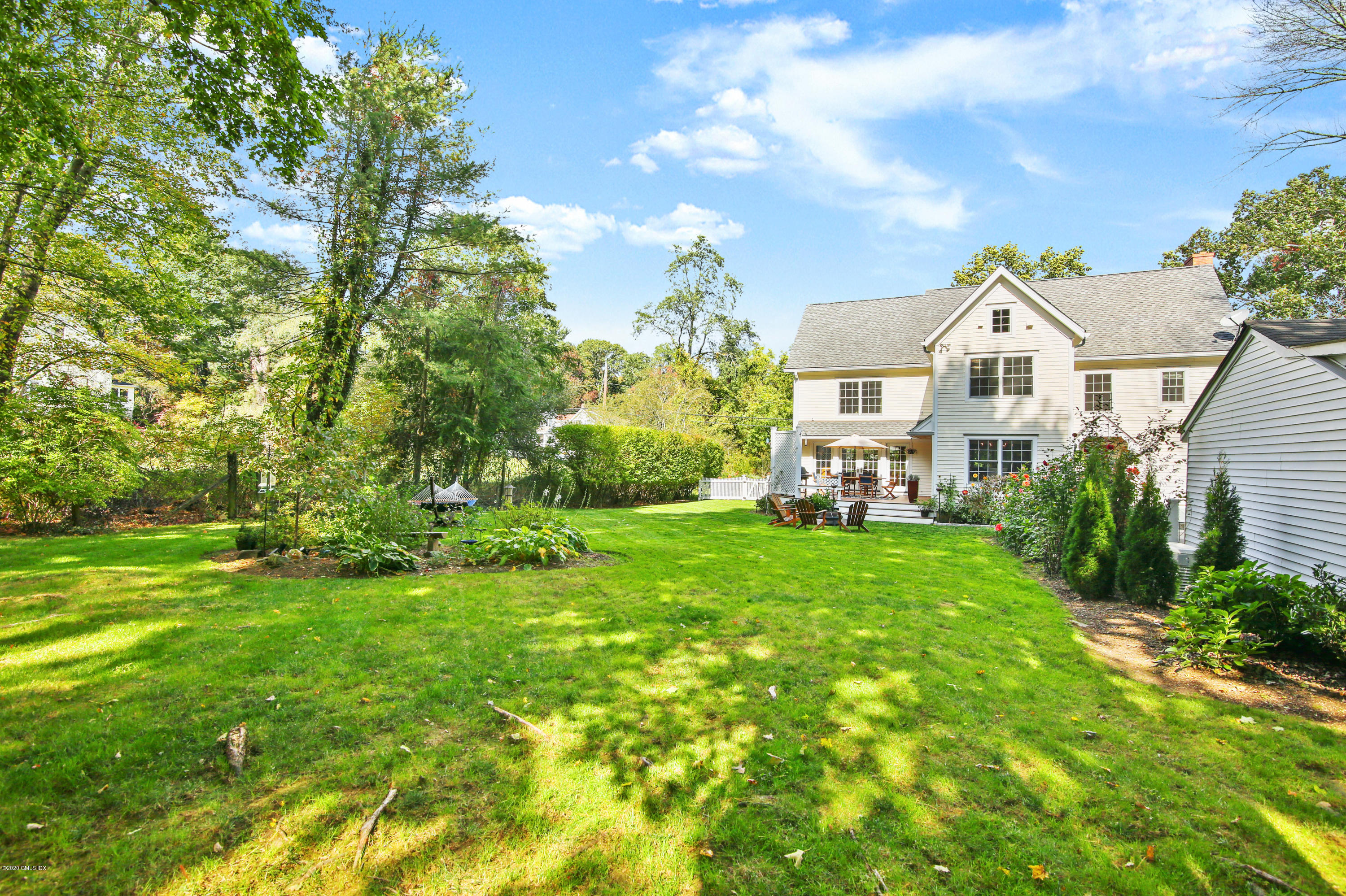 20 Scott Road Greenwich, CT 06831 - Photo 34 of 42 a front view of a house with a yard