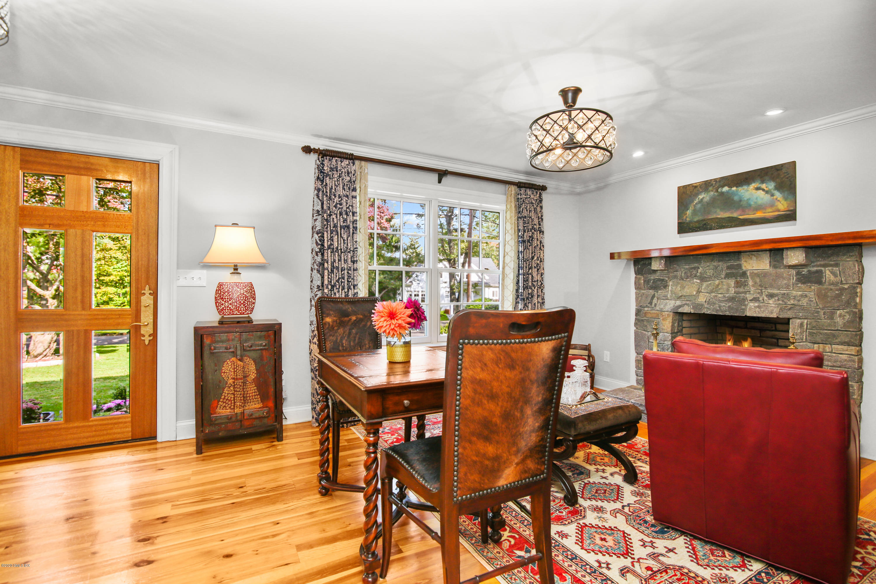20 Scott Road Greenwich, CT 06831 - Photo 6 of 42 a view of a dining room with furniture window and wooden floor