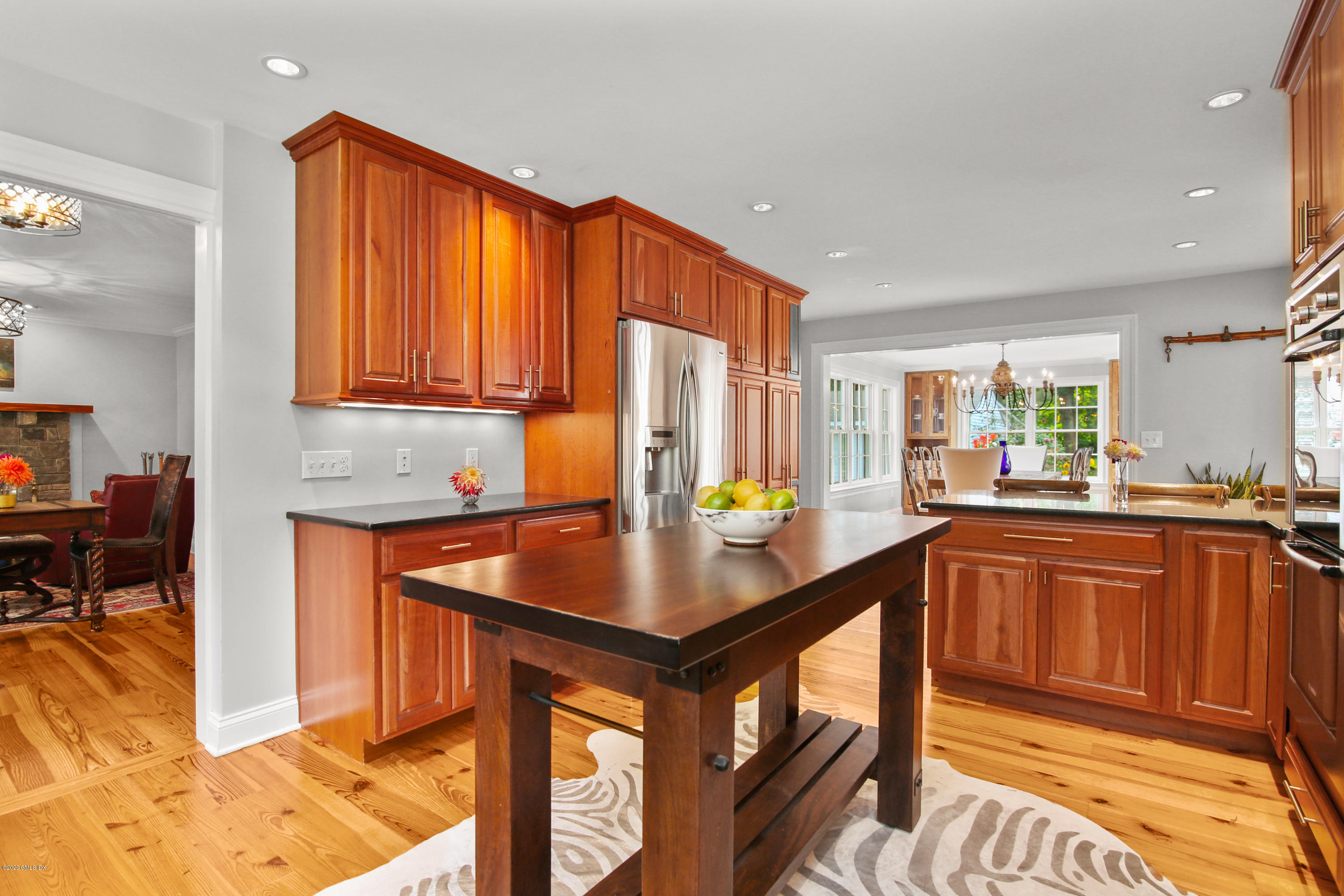 20 Scott Road Greenwich, CT 06831 - Photo 9 of 42 a kitchen with stainless steel appliances granite countertop wooden cabinets a sink and a stove