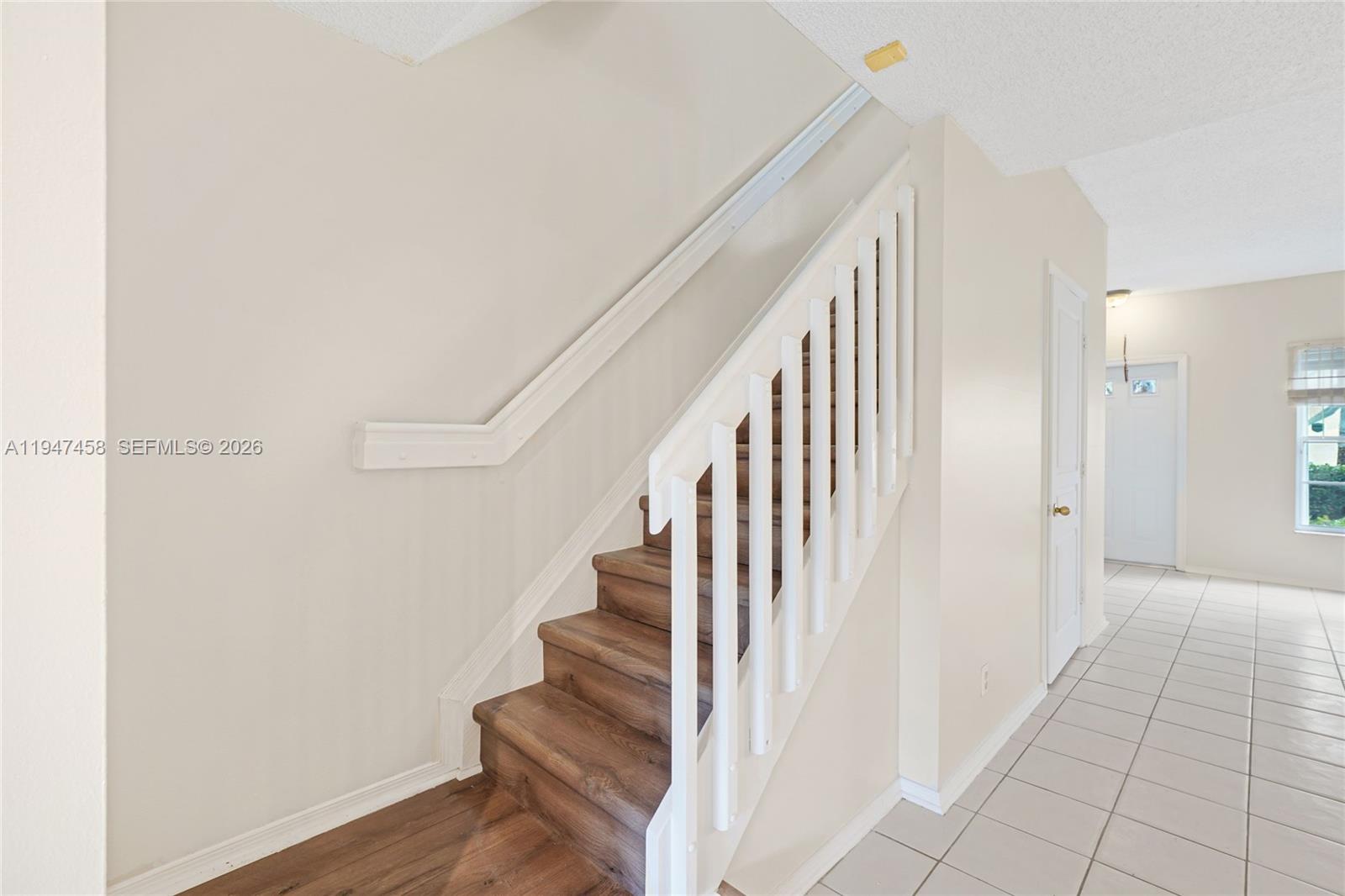 4 Key W Court, Unit 4 Weston, FL 33326 - Photo 17 of 29 a view of entryway with wooden floor