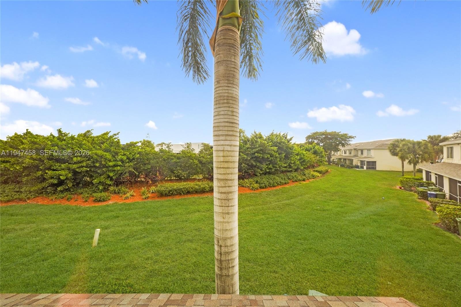 4 Key W Court, Unit 4 Weston, FL 33326 - Photo 26 of 29 a view of a golf course with a big yard