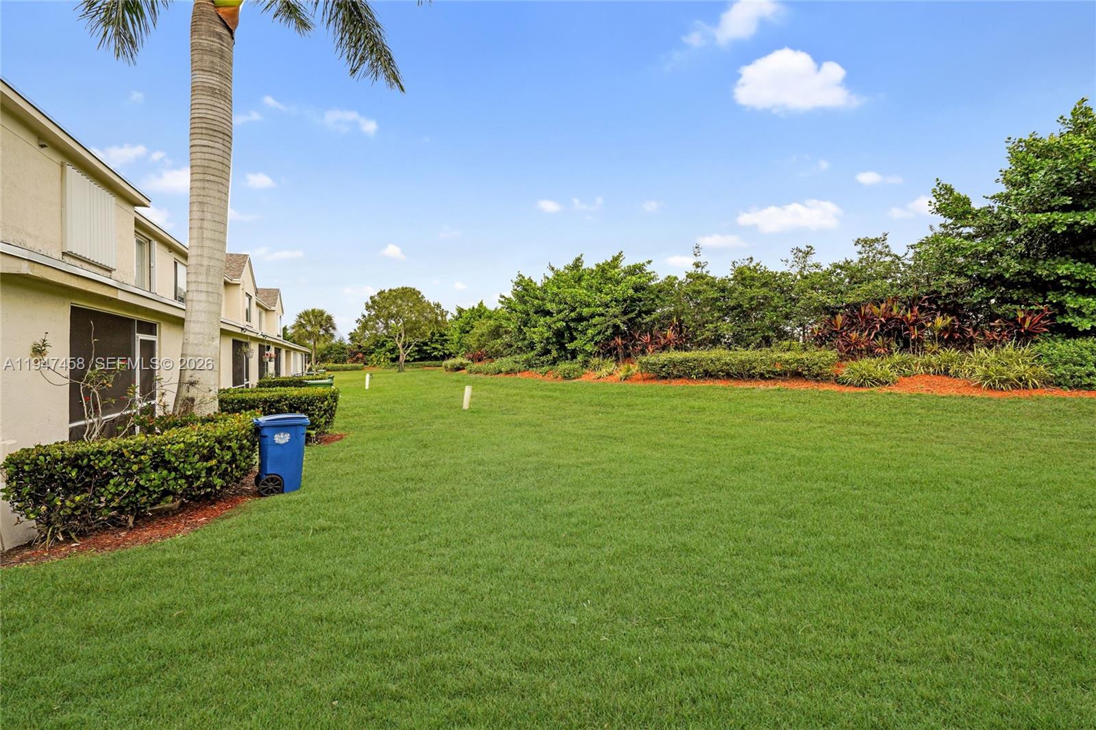 4 Key W Court, Unit 4 Weston, FL 33326 - Photo 28 of 29 a view of a garden with a house