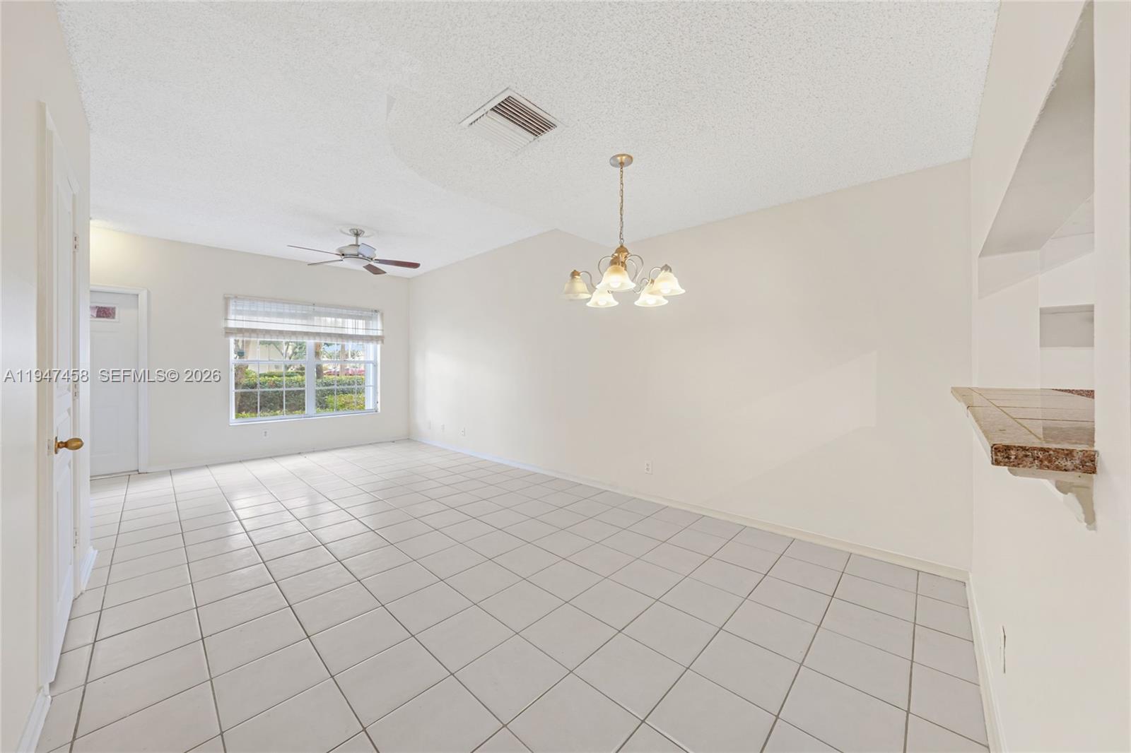 4 Key W Court, Unit 4 Weston, FL 33326 - Photo 5 of 29 a view of empty room with window