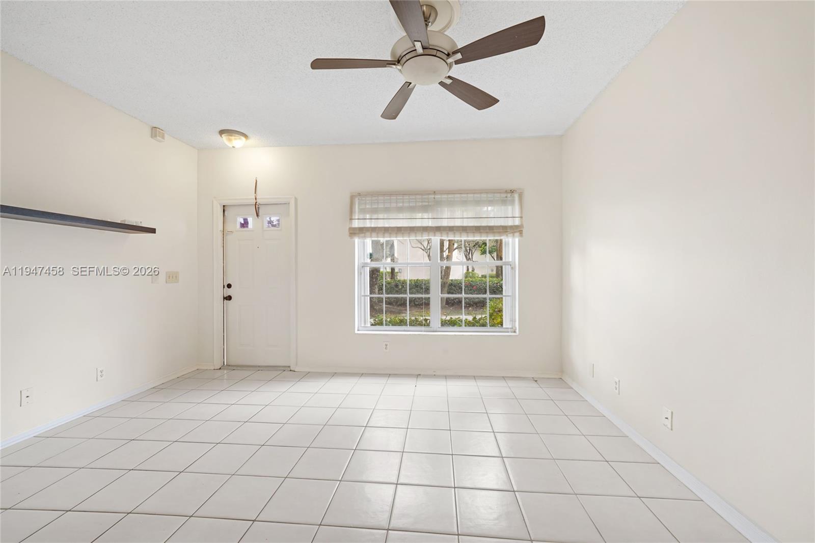 4 Key W Court, Unit 4 Weston, FL 33326 - Photo 8 of 29 a view of an empty room with a window