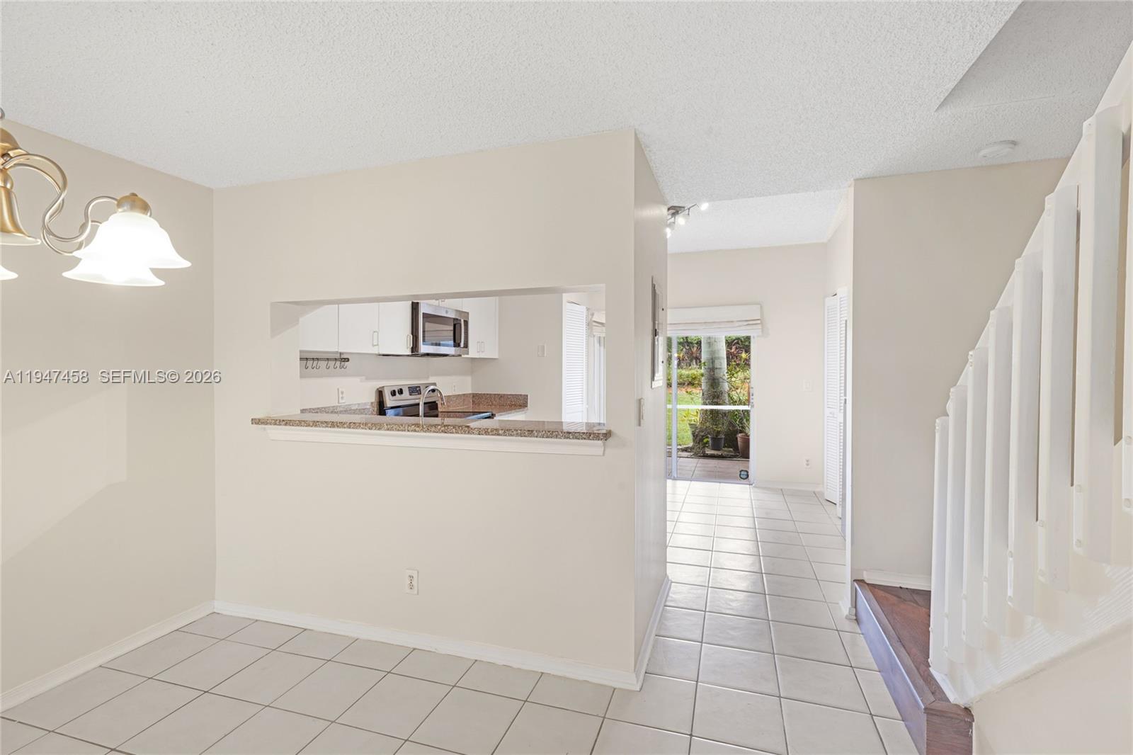 4 Key W Court, Unit 4 Weston, FL 33326 - Photo 9 of 29 a view of a kitchen with a sink