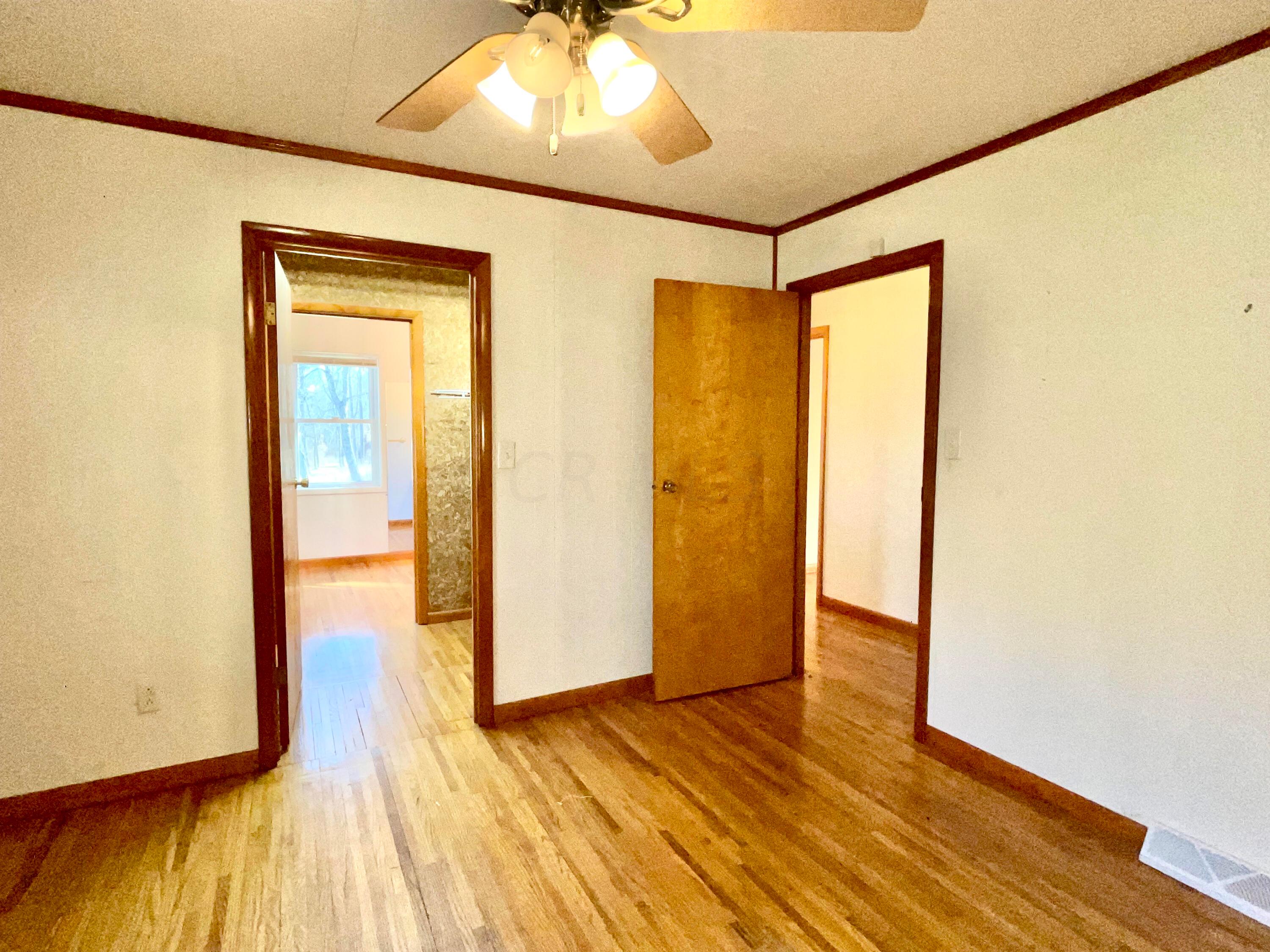 1368 Allen Road Beaver, OH 45613 - Photo 23 of 77 A view of the primary bedroom looking out to the hall and back to the private bathroom.
