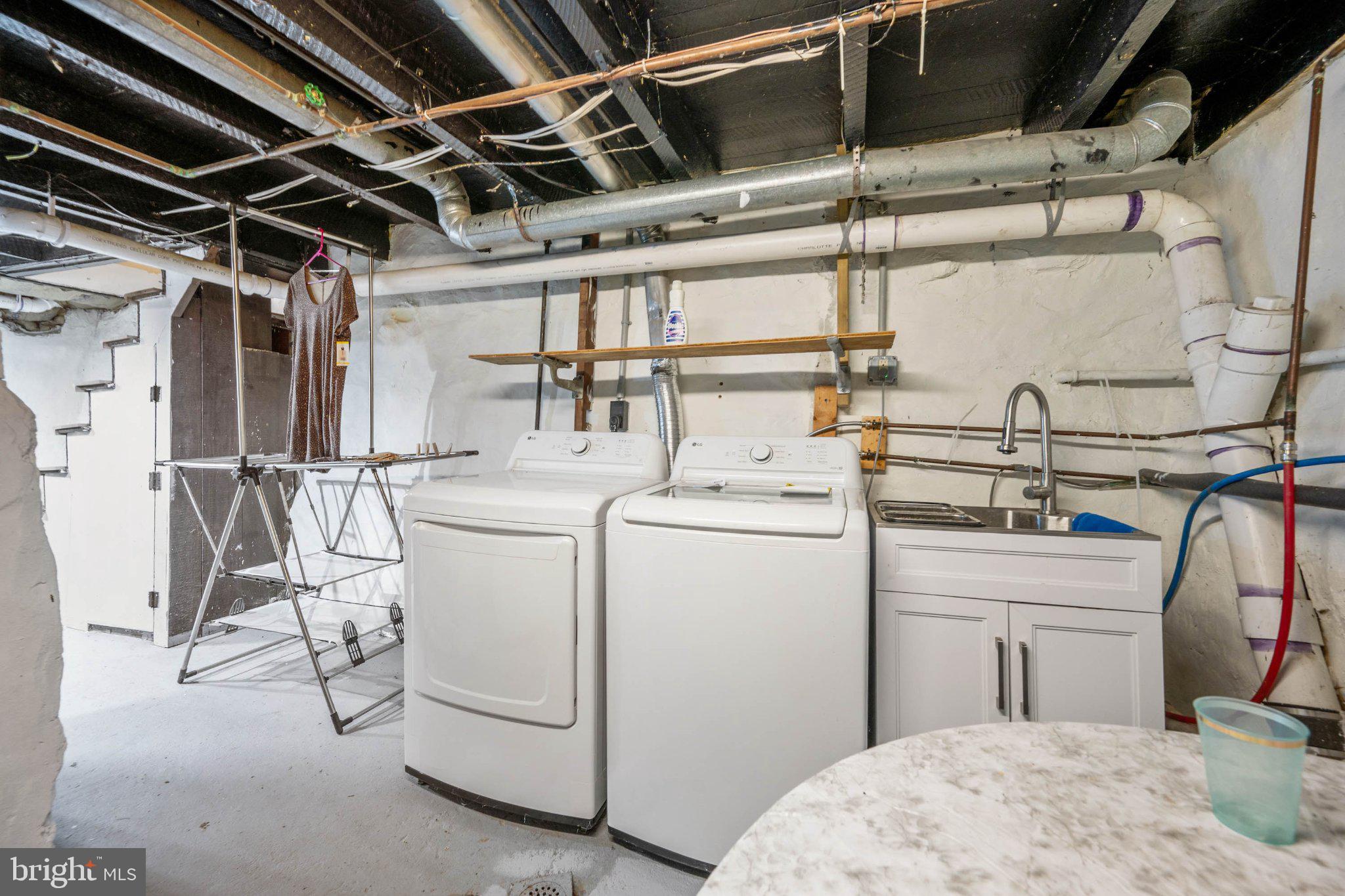 3355 Falls Road Baltimore, MD 21211 - Photo 40 of 45 Functional laundry space in the basement.