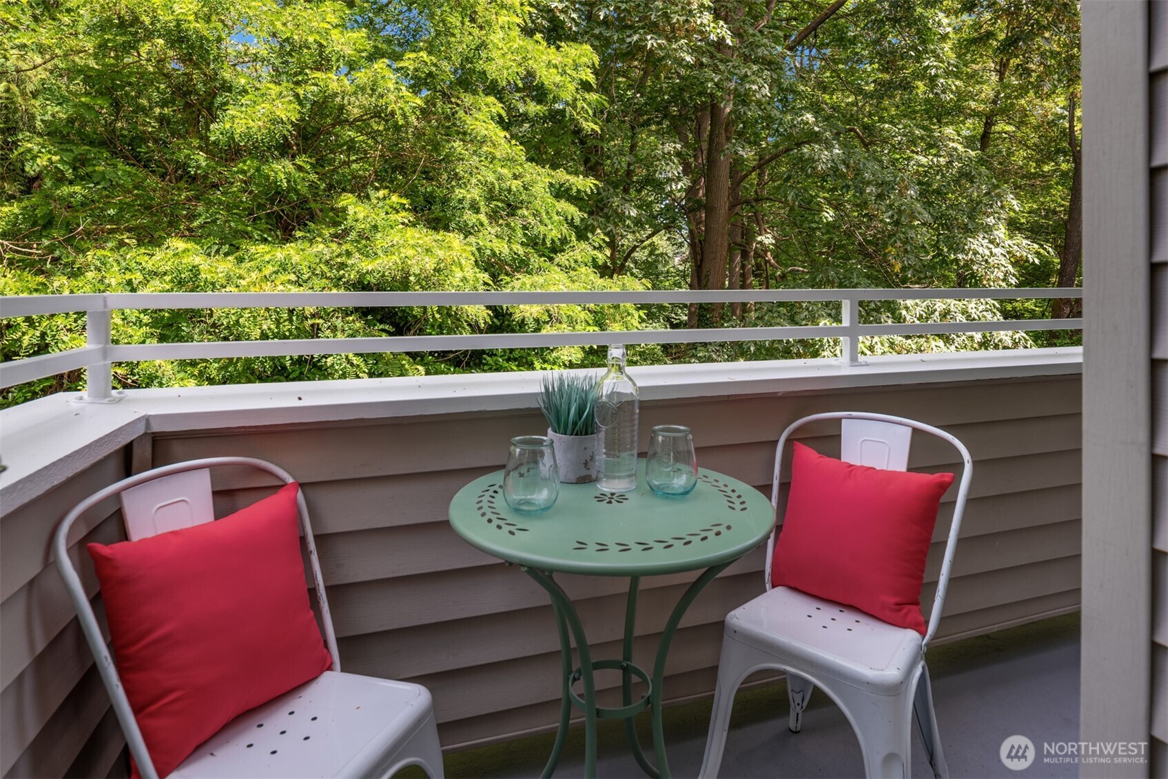 3302 West Government Way, Unit A Seattle, WA 98199 - Photo 6 of 32 a view of a chairs in balcony
