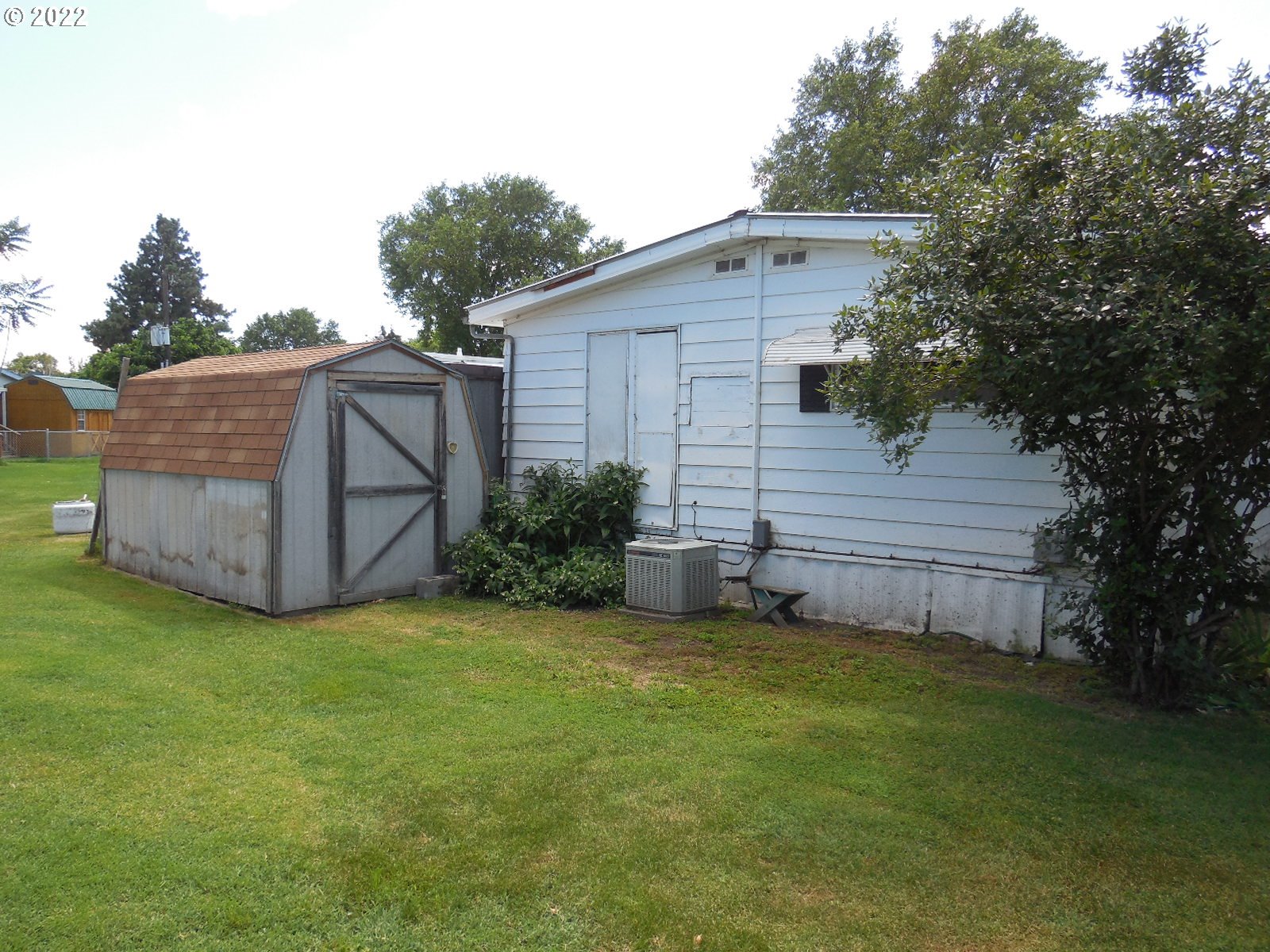 53785 West Crockett Road Milton Freewater, OR 97862 - Photo 3 of 14 a view of a house with a backyard
