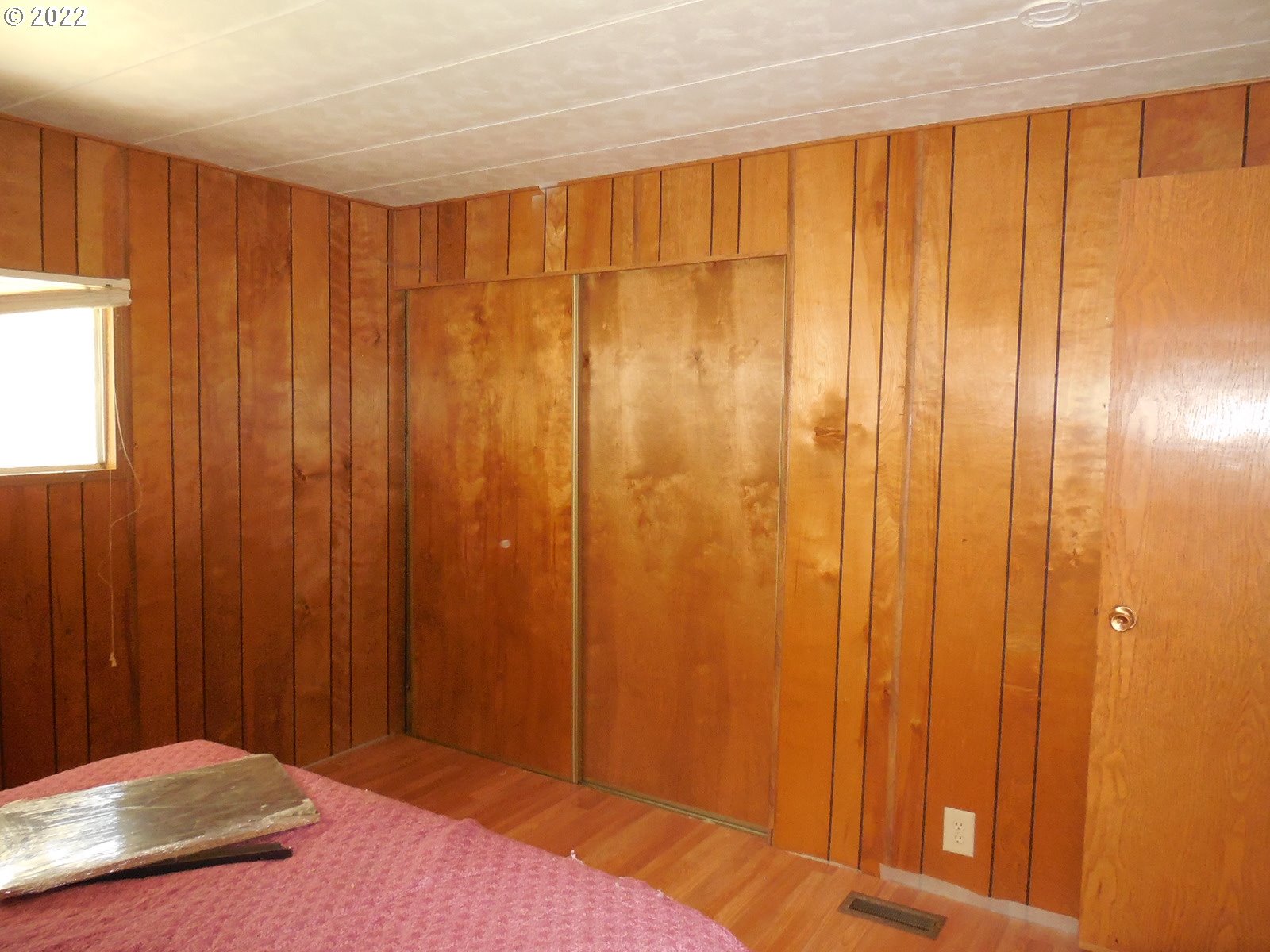 53785 West Crockett Road Milton Freewater, OR 97862 - Photo 9 of 14 a bedroom with a bed and curtain