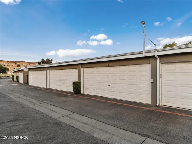 a view of a house with a garage