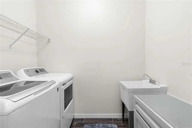 a utility room with dryer and washer