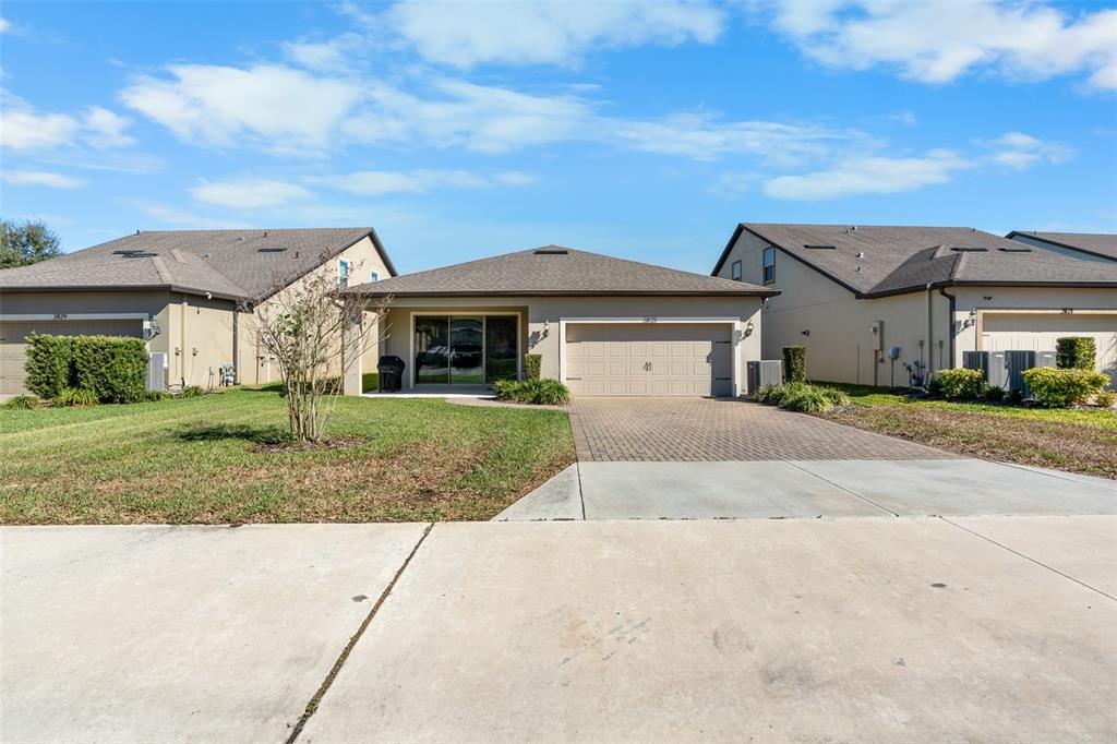 2825 Murray Pass Odessa, FL 33556 - Photo 37 of 43 front view of a house with a yard