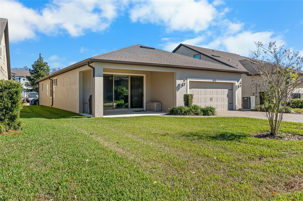2825 Murray Pass Odessa, FL 33556 - Photo 38 of 43 a view of a house with yard and tree s