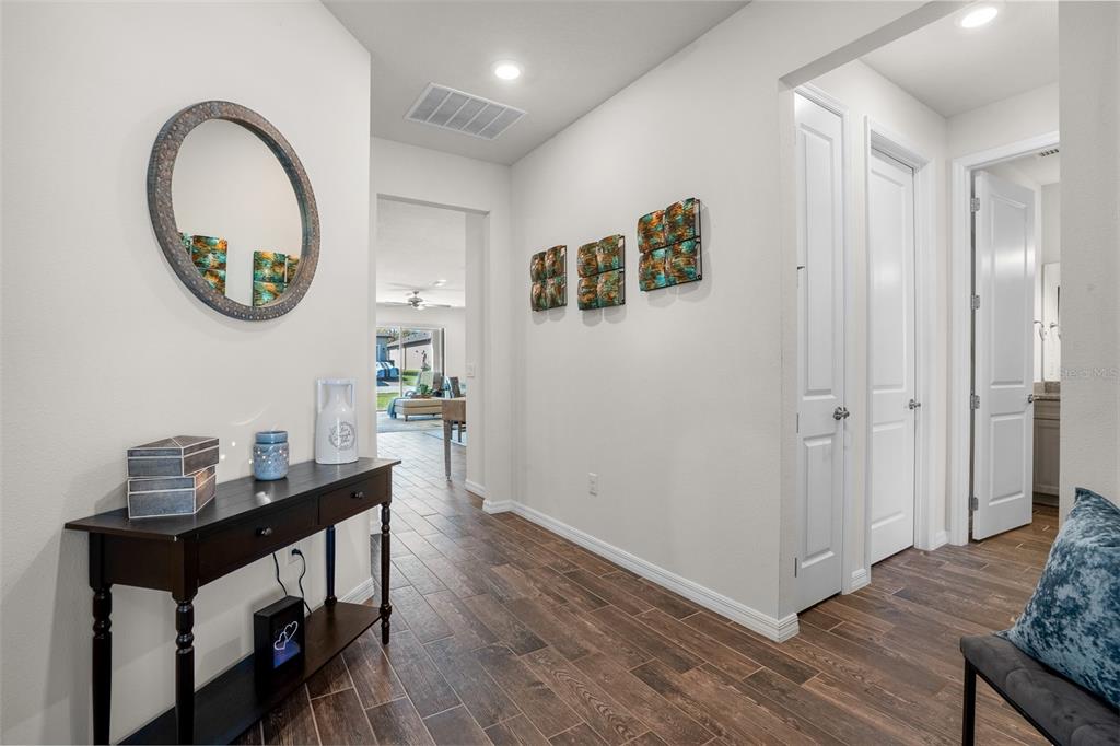 2825 Murray Pass Odessa, FL 33556 - Photo 5 of 43 a view of a livingroom with furniture and mirror