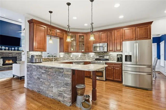 a view of room with a ceiling fan and window