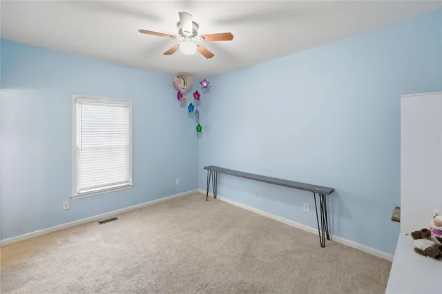 a bathroom with a sink a mirror and vanity