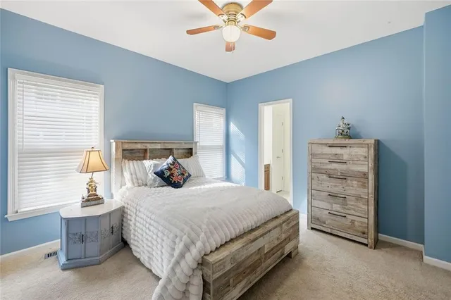 a room with furniture and flat screen tv