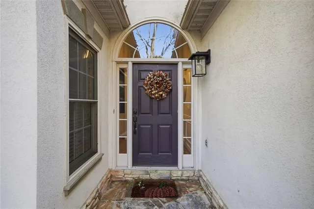 a view of entryway with a front door
