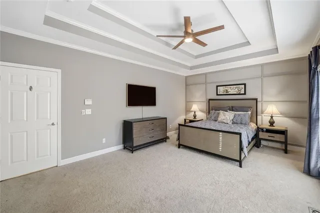 a white bath tub sitting next to a window