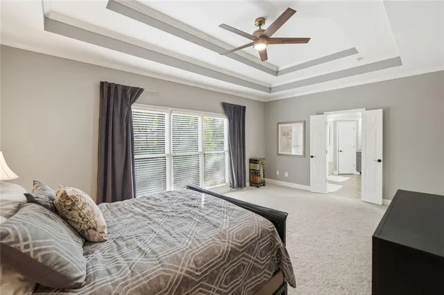 a bathroom with bathtub and window