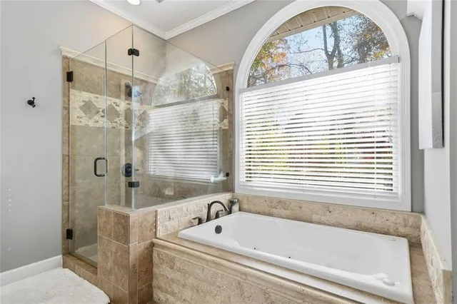 a view of a deck with table and chairs and wooden floor