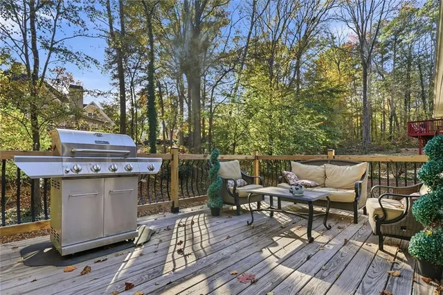 a spacious bedroom with a bed and a dresser